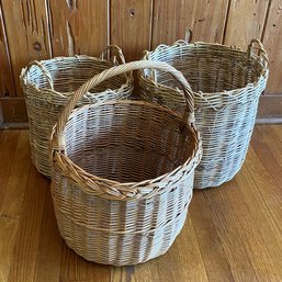 A Trio Of Hand Woven Decorative Basket