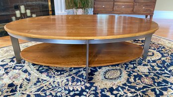 Ethan Allen Cherry Wood Oval Coffee Table On Metal Legs.