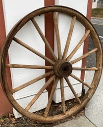 An Antique Wood Wagon Wheel