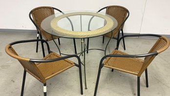 Round Glass And Metal Patio Table With Four Chairs.