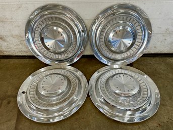 Four Pontiac Tempest Wheels Hubcaps.(10)