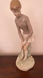 A Vintage Lladro Retired  Porcelain Figurine, Young Woman Golfer Making A Putt.