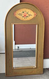 A Vintage Painted Mirror With Decorative Floral Details