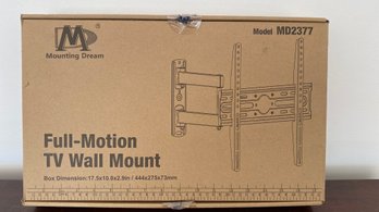 A Brand New In  Box Full Motion Tv Wall Mount.