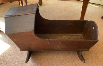 An ANTIQUE CRADLE America, 19th Century With Cut-out Hearts Solid Wood