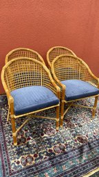 A Vintage Set Of Four Wicker Side Chairs With Cushions