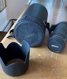 A Nikon - Nikkor 80-200mm - 1:2.8 D Lens With Case