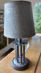 An Antique Tin Round Candle Mold Converted Lamp With Pierced Tin Shade