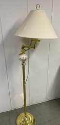 A Vintage Swivel Ceramic And Brass Floor Lamp