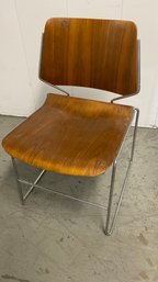 A Classic Bended Wood Desk Chair With Steel Frame