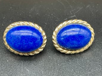 Pair Of 14k Gold And Blue Stone Earrings.