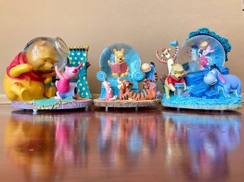 Trio Of Winnie The Pooh Snow Globes Music Boxes. (1)