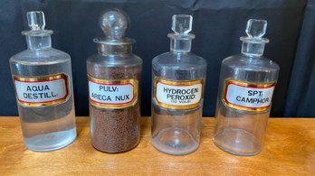 A GROUP OF Antique Apothecary Bottles