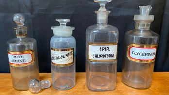 A GROUP OF Antique Apothecary Bottles