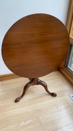 An Antique Bird Cage Base Tilt Top  Mahoghany Round Table