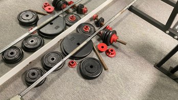 A  Group Of Barbell York  Weights With Bar & More