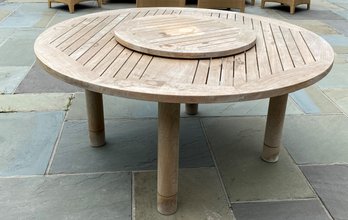 A BARLOW TYRIE SOLID TEAK WOOD ROUND DINING TABLE WITH LAZY SUSAN - 52' Diameter