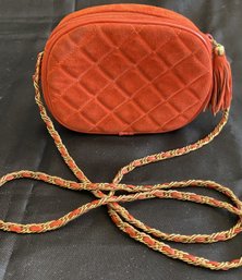 An Adorable Red Oval Cross Body Bag