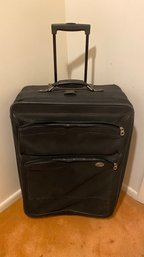 An American Tourister Black Travel Suitcase