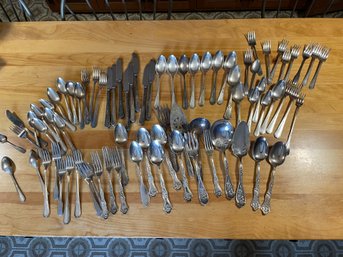 Large Assortment Of Silver Plated Flatwares.