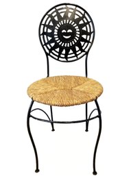 Wrought Iron And Woven Wicker Accent Chair With Whimsical Sun Cut Out Seat Back