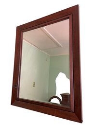 Wooden Framed Beveled Mirror.