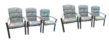 Six Patio Armchairs With Floral Earth Toned Cushions
