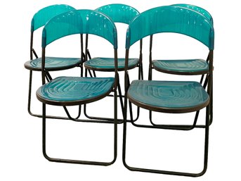 Five Acrylic And Metal Folding Chairs.