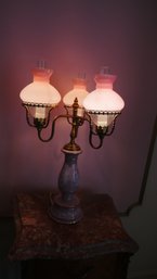 A Set Of Roman Themed Lamps