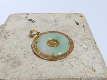 Vintage Translucent Jade Disc Pendant With 14K Yellow Gold Mounting