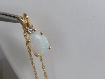 14 K Yellow Gold , Opal & Diamond Pendant With Chain