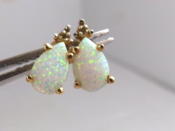 Pair Of 14K Yellow Gold & Tear Drop Shaped Opal Earrings