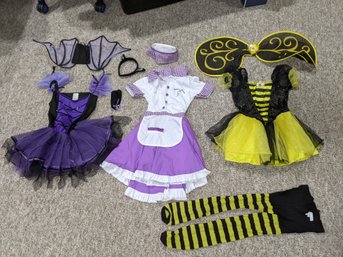 Collection Of Girls Halloween Costumes Including Vampirina, Waitress And Bee