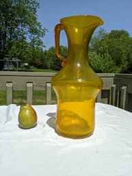 Large Hand Blown Pitcher In A Burnt Yellow Glass