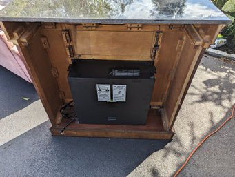 Electric Fireplace  Granite Like Top And What Looks Like Cherry Wood