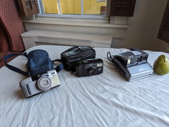 Collection Of Three Cameras