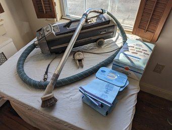 Electrolux Vacuum Cleaner With Some Attachments And Extra Bags