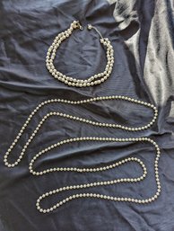 A Collection Of Three Faux Pearl Necklaces