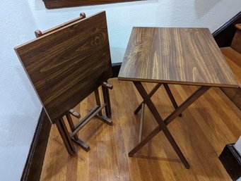 A Pair Of Folding Tables And Stand