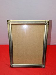 Fetco Brushed Gold Accented Frame