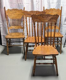 Vintage Early 20th Century Set Of 4 Carved Detailed Oak Wood Chairs.