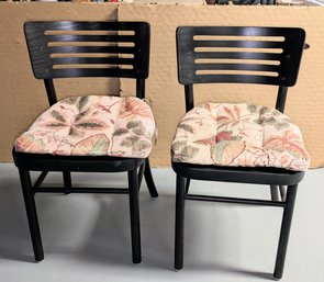 Pair Of 2 Black Chairs With Floral Tie On Cushions
