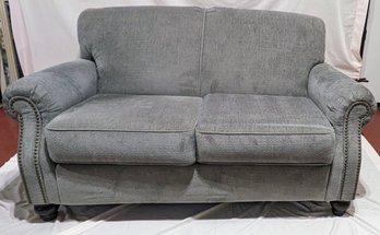 Ashley Gray Loveseat With Nail Head Design