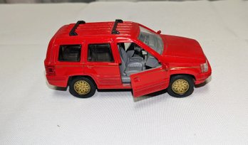 Vintage Diecast 1996 Red Jeep Grand Cherokee