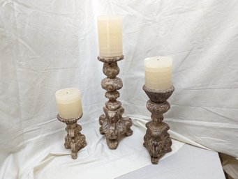 Collection Of Three Candles And Stands