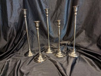 Collection Of Five Candle Sticks By Sadek