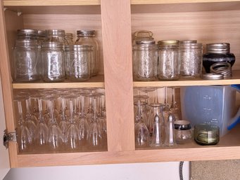 Contents Of Cabinet Including Mason Jars And Wine Glasses