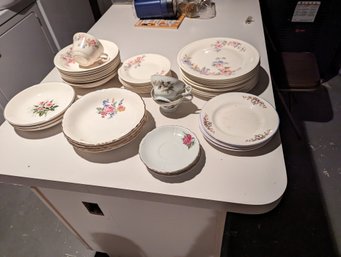 Collection Of Assorted Plates And Tea Cups