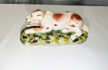 Antique Pottery Staffordshire Dog Lying On Pillow Statue