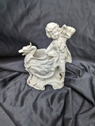 Porcelain Boy With A Bird Vase